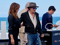 Johnny Depp attends the photocall of ''Modi, Three Days on the Wing of Madness'' during the 72nd San Sebastian International Film Festival....