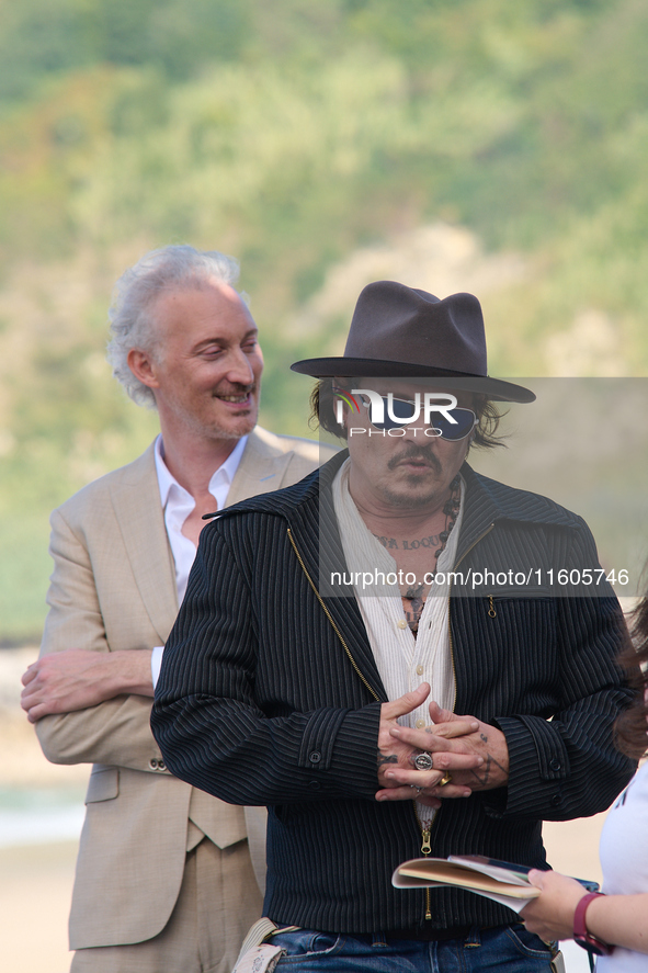 Johnny Depp attends the photocall of ''Modi, Three Days on the Wing of Madness'' during the 72nd San Sebastian International Film Festival i...