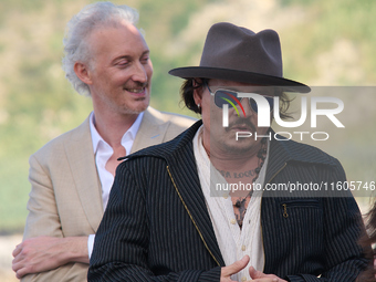 Johnny Depp attends the photocall of ''Modi, Three Days on the Wing of Madness'' during the 72nd San Sebastian International Film Festival i...