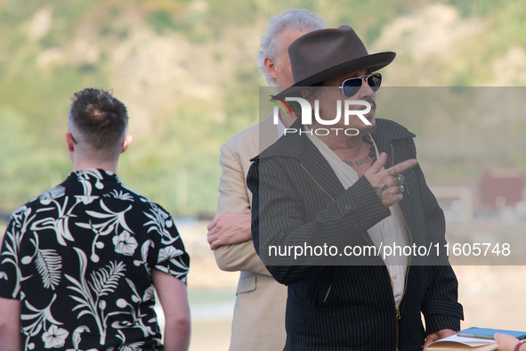 Johnny Depp attends the photocall of ''Modi, Three Days on the Wing of Madness'' during the 72nd San Sebastian International Film Festival i...