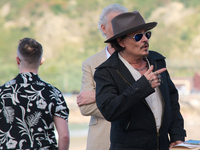 Johnny Depp attends the photocall of ''Modi, Three Days on the Wing of Madness'' during the 72nd San Sebastian International Film Festival i...