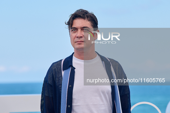 Riccardo Scarmarcio attends the photocall of Modi, Three Days on the Wing of Madness during the 72nd San Sebastian International Film Festiv...