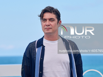 Riccardo Scarmarcio attends the photocall of Modi, Three Days on the Wing of Madness during the 72nd San Sebastian International Film Festiv...