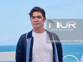 Riccardo Scarmarcio attends the photocall of Modi, Three Days on the Wing of Madness during the 72nd San Sebastian International Film Festiv...