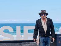 Johnny Depp attends the photocall of ''Modi, Three Days on the Wing of Madness'' during the 72nd San Sebastian International Film Festival i...