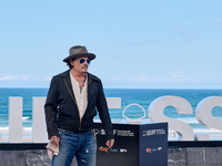 Johnny Depp attends the photocall of ''Modi, Three Days on the Wing of Madness'' during the 72nd San Sebastian International Film Festival i...