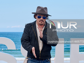 Johnny Depp attends the photocall of ''Modi, Three Days on the Wing of Madness'' during the 72nd San Sebastian International Film Festival i...