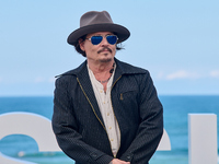 Johnny Depp attends the photocall of ''Modi, Three Days on the Wing of Madness'' during the 72nd San Sebastian International Film Festival i...