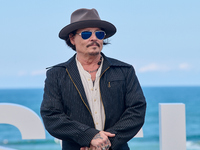 Johnny Depp attends the photocall of ''Modi, Three Days on the Wing of Madness'' during the 72nd San Sebastian International Film Festival i...