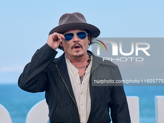 Johnny Depp attends the photocall of ''Modi, Three Days on the Wing of Madness'' during the 72nd San Sebastian International Film Festival i...