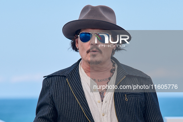 Johnny Depp attends the photocall of ''Modi, Three Days on the Wing of Madness'' during the 72nd San Sebastian International Film Festival i...