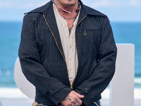 Johnny Depp attends the photocall of ''Modi, Three Days on the Wing of Madness'' during the 72nd San Sebastian International Film Festival i...