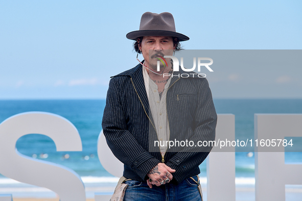 Johnny Depp attends the photocall of ''Modi, Three Days on the Wing of Madness'' during the 72nd San Sebastian International Film Festival i...