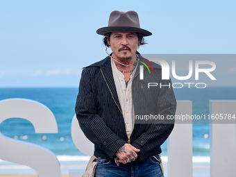 Johnny Depp attends the photocall of ''Modi, Three Days on the Wing of Madness'' during the 72nd San Sebastian International Film Festival i...