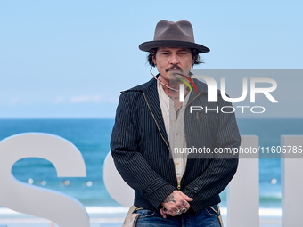 Johnny Depp attends the photocall of ''Modi, Three Days on the Wing of Madness'' during the 72nd San Sebastian International Film Festival i...