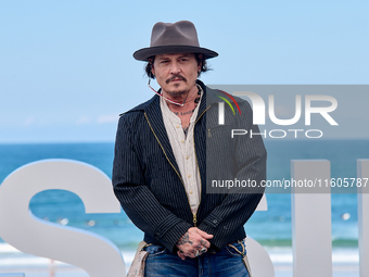 Johnny Depp attends the photocall of ''Modi, Three Days on the Wing of Madness'' during the 72nd San Sebastian International Film Festival i...