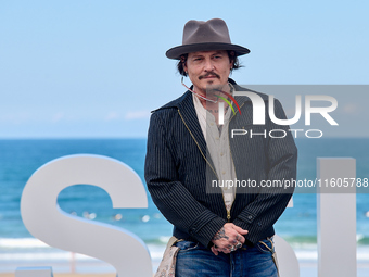 Johnny Depp attends the photocall of ''Modi, Three Days on the Wing of Madness'' during the 72nd San Sebastian International Film Festival i...