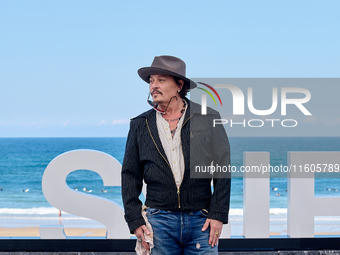 Johnny Depp attends the photocall of ''Modi, Three Days on the Wing of Madness'' during the 72nd San Sebastian International Film Festival i...