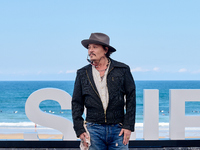 Johnny Depp attends the photocall of ''Modi, Three Days on the Wing of Madness'' during the 72nd San Sebastian International Film Festival i...