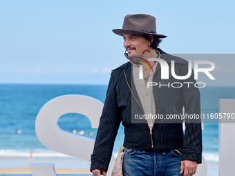 Johnny Depp attends the photocall of ''Modi, Three Days on the Wing of Madness'' during the 72nd San Sebastian International Film Festival i...