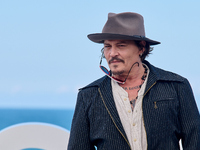 Johnny Depp attends the photocall of ''Modi, Three Days on the Wing of Madness'' during the 72nd San Sebastian International Film Festival i...