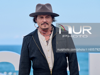 Johnny Depp attends the photocall of ''Modi, Three Days on the Wing of Madness'' during the 72nd San Sebastian International Film Festival i...