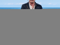 Johnny Depp attends the photocall of ''Modi, Three Days on the Wing of Madness'' during the 72nd San Sebastian International Film Festival i...