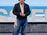 Johnny Depp attends the photocall of ''Modi, Three Days on the Wing of Madness'' during the 72nd San Sebastian International Film Festival i...