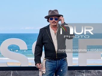 Johnny Depp attends the photocall of ''Modi, Three Days on the Wing of Madness'' during the 72nd San Sebastian International Film Festival i...