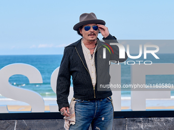 Johnny Depp attends the photocall of ''Modi, Three Days on the Wing of Madness'' during the 72nd San Sebastian International Film Festival i...