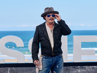 Johnny Depp attends the photocall of ''Modi, Three Days on the Wing of Madness'' during the 72nd San Sebastian International Film Festival i...