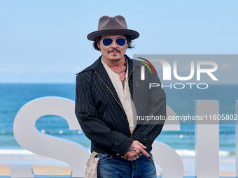 Johnny Depp attends the photocall of ''Modi, Three Days on the Wing of Madness'' during the 72nd San Sebastian International Film Festival i...