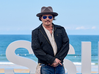 Johnny Depp attends the photocall of ''Modi, Three Days on the Wing of Madness'' during the 72nd San Sebastian International Film Festival i...