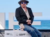 Johnny Depp attends the photocall of ''Modi, Three Days on the Wing of Madness'' during the 72nd San Sebastian International Film Festival i...