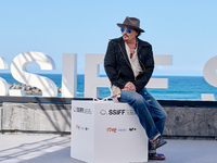 Johnny Depp attends the photocall of ''Modi, Three Days on the Wing of Madness'' during the 72nd San Sebastian International Film Festival i...