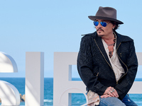 Johnny Depp attends the photocall of ''Modi, Three Days on the Wing of Madness'' during the 72nd San Sebastian International Film Festival i...