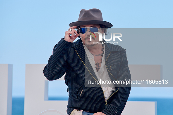 Johnny Depp attends the photocall of ''Modi, Three Days on the Wing of Madness'' during the 72nd San Sebastian International Film Festival i...