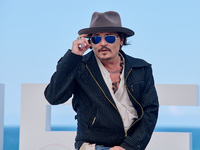 Johnny Depp attends the photocall of ''Modi, Three Days on the Wing of Madness'' during the 72nd San Sebastian International Film Festival i...