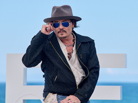 Johnny Depp attends the photocall of ''Modi, Three Days on the Wing of Madness'' during the 72nd San Sebastian International Film Festival i...