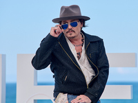 Johnny Depp attends the photocall of ''Modi, Three Days on the Wing of Madness'' during the 72nd San Sebastian International Film Festival i...