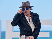 Johnny Depp attends the photocall of ''Modi, Three Days on the Wing of Madness'' during the 72nd San Sebastian International Film Festival i...