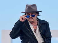 Johnny Depp attends the photocall of ''Modi, Three Days on the Wing of Madness'' during the 72nd San Sebastian International Film Festival i...