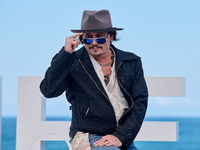 Johnny Depp attends the photocall of ''Modi, Three Days on the Wing of Madness'' during the 72nd San Sebastian International Film Festival i...