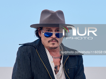 Johnny Depp attends the photocall of ''Modi, Three Days on the Wing of Madness'' during the 72nd San Sebastian International Film Festival i...