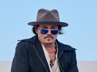 Johnny Depp attends the photocall of ''Modi, Three Days on the Wing of Madness'' during the 72nd San Sebastian International Film Festival i...