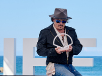 Johnny Depp attends the photocall of ''Modi, Three Days on the Wing of Madness'' during the 72nd San Sebastian International Film Festival i...