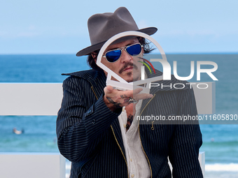 Johnny Depp attends the photocall of ''Modi, Three Days on the Wing of Madness'' during the 72nd San Sebastian International Film Festival i...