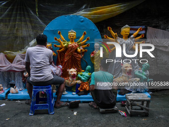 Artists make idols of Goddess Durga ahead of the Durga Puja festival in Kolkata, India, on September 24, 2024. (