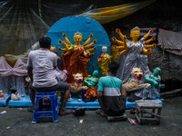 Artists make idols of Goddess Durga ahead of the Durga Puja festival in Kolkata, India, on September 24, 2024. (