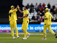 Mitchell Starc of Australia and teammates celebrate the wicket of Phil Salt of England during the Metro Bank One Day Series match between En...